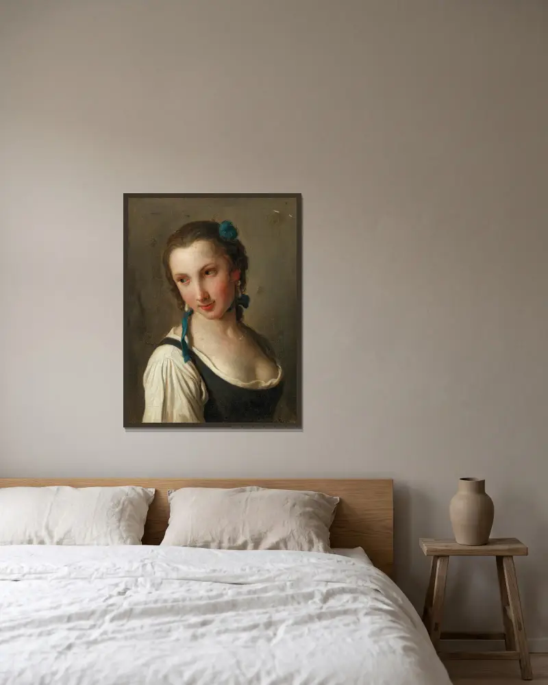 Ung kvinna med en blomma i håret av Pietro Rotari inramad på en vägg