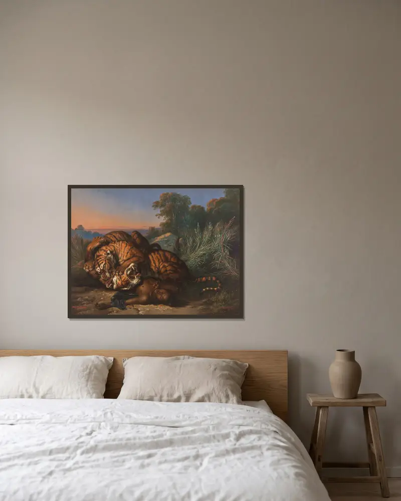 Kämpfende Tiger av Raden Saleh inramad på en vägg