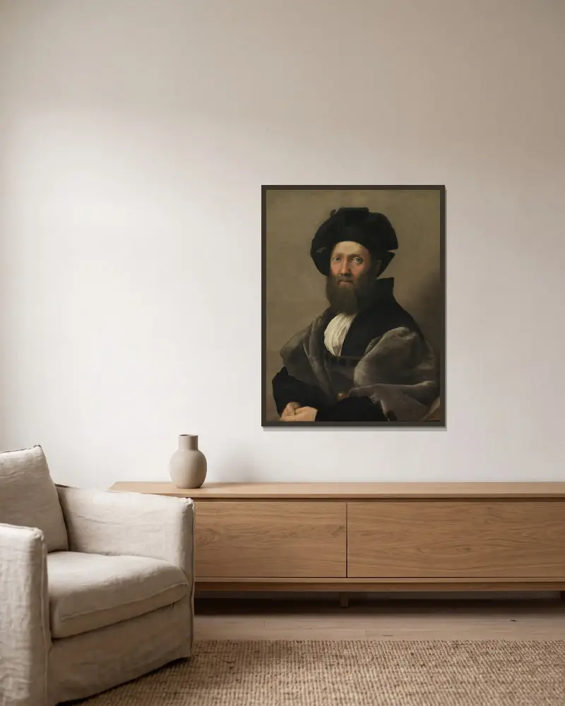 Portrait of Baldassarre Castiglione av Raphael inramad på en vägg