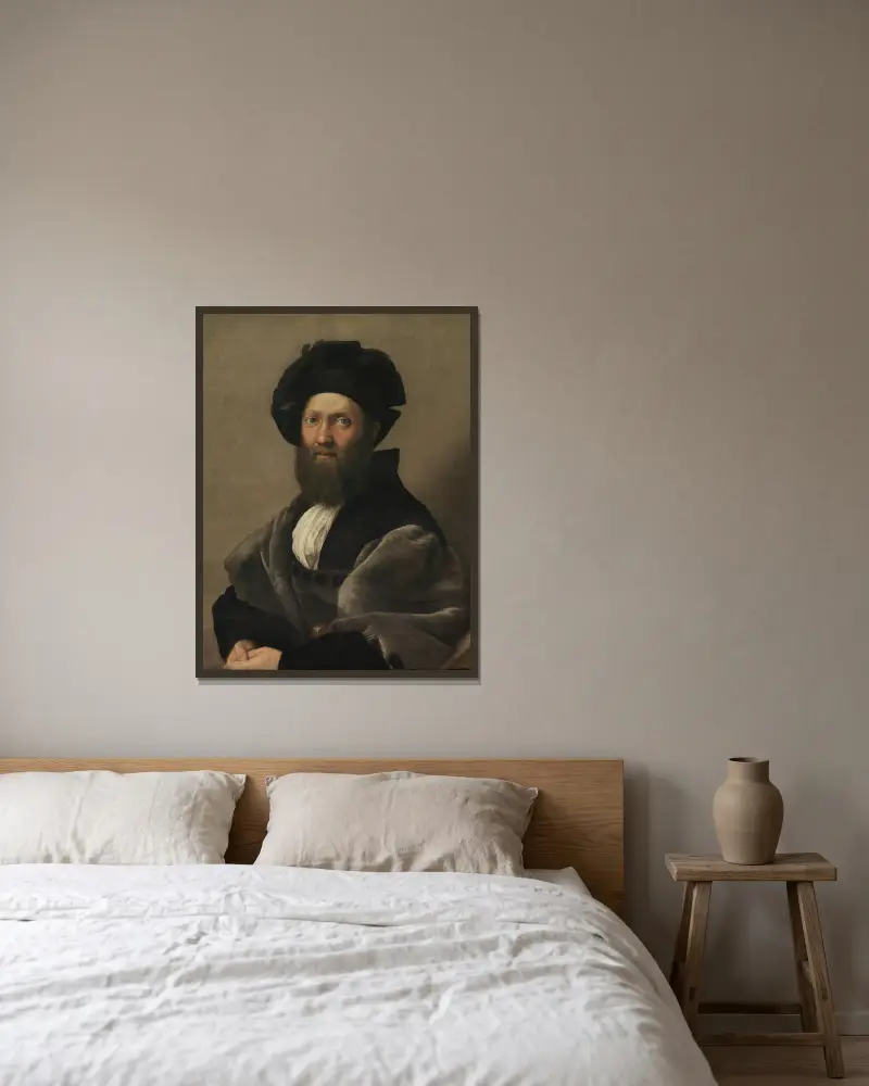 Portrait of Baldassarre Castiglione av Raphael inramad på en vägg