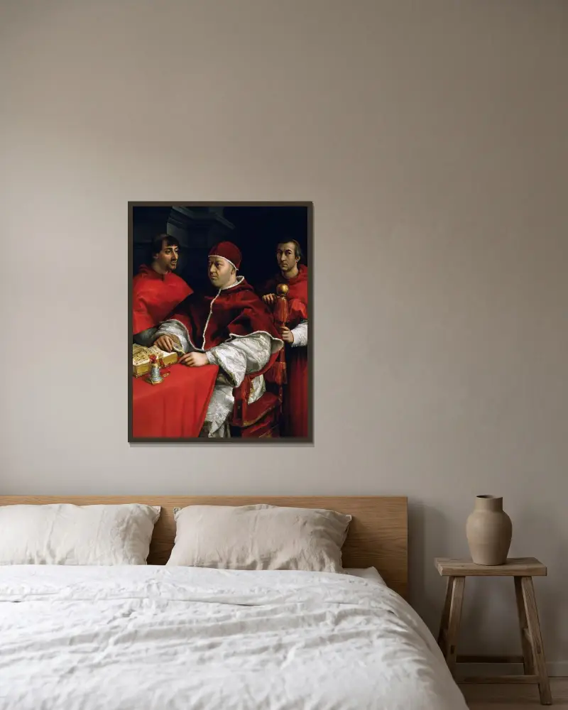 Portrait of Pope Leo X with Cardinals Giulio de’ Medici and Luigi de’ Rossi von Raphael gerahmt an einer Wand