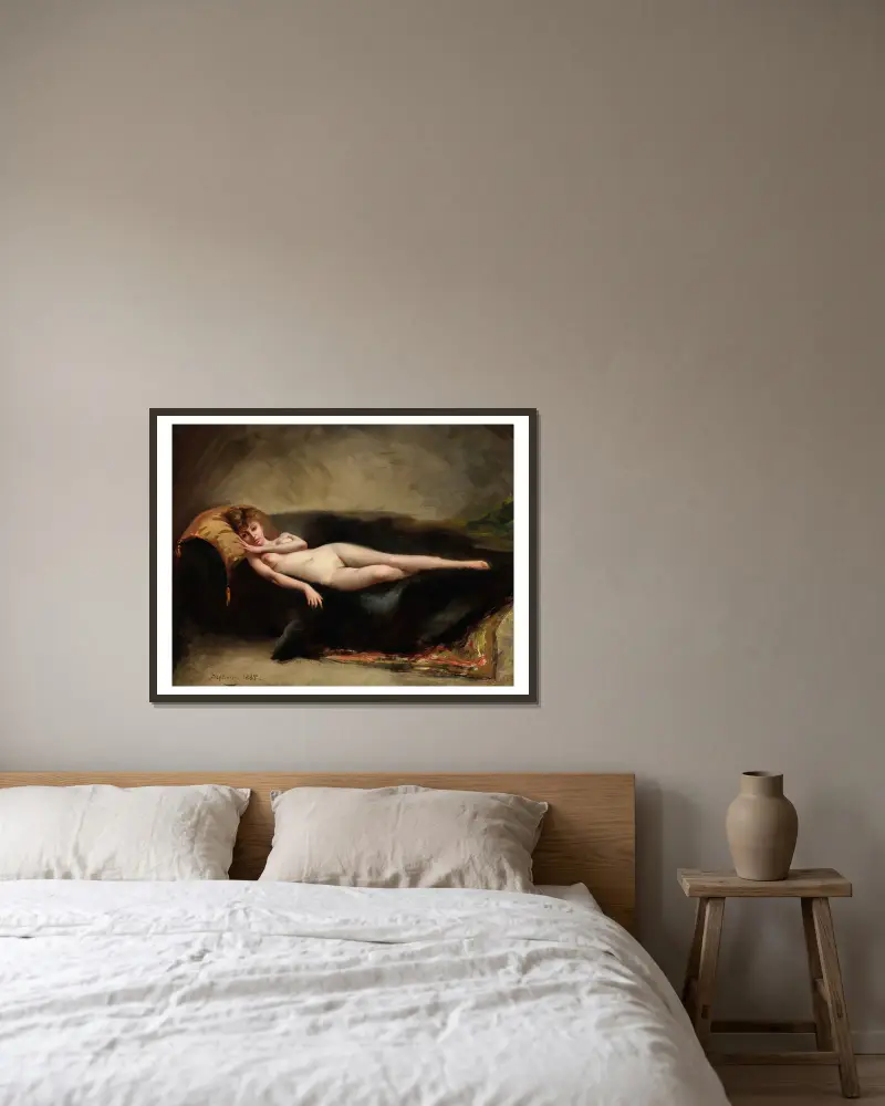 Liggande naken kvinna på en divan av Luis Ricardo Falero inramad på en vägg