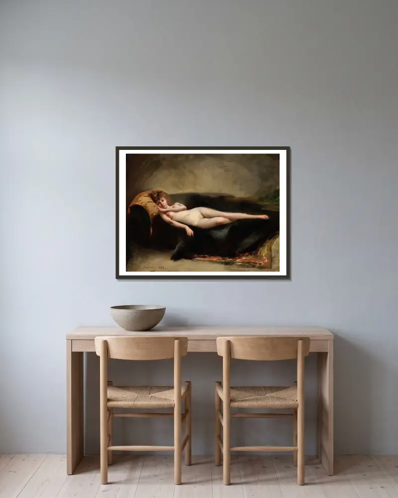 Liggande naken kvinna på en divan av Luis Ricardo Falero inramad på en vägg