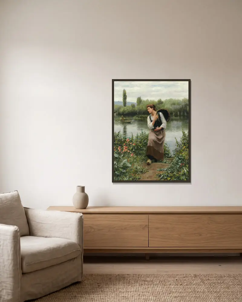 Kvinna med korg av Daniel Ridgway Knight inramad på en vägg