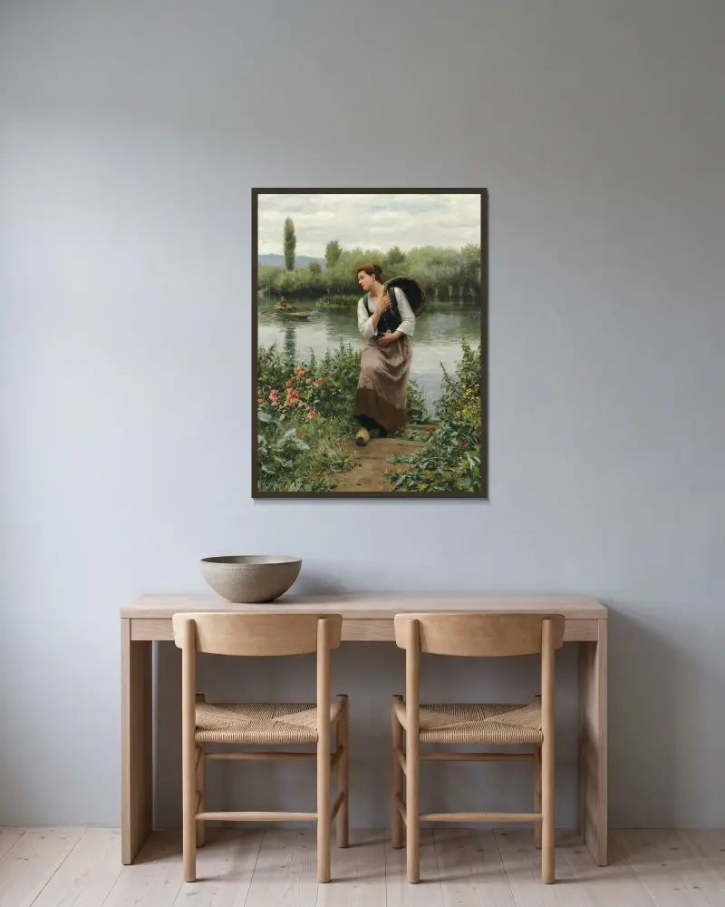Kvinna med korg av Daniel Ridgway Knight inramad på en vägg