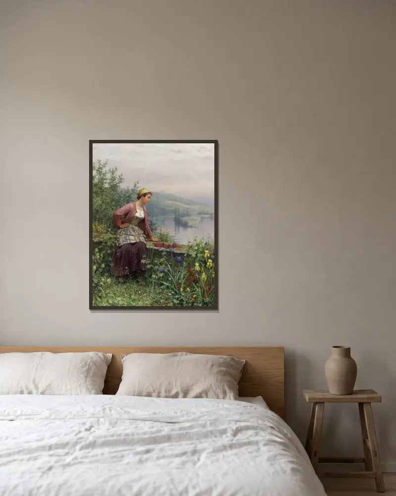 Brittany Girl Overlooking A Stream av Daniel Ridgway Knight inramad på en vägg