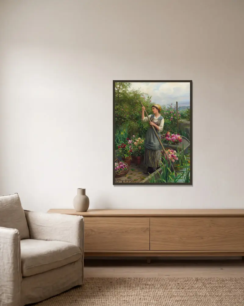 Blomsterplockning längs floden av Daniel Ridgway Knight inramad på en vägg