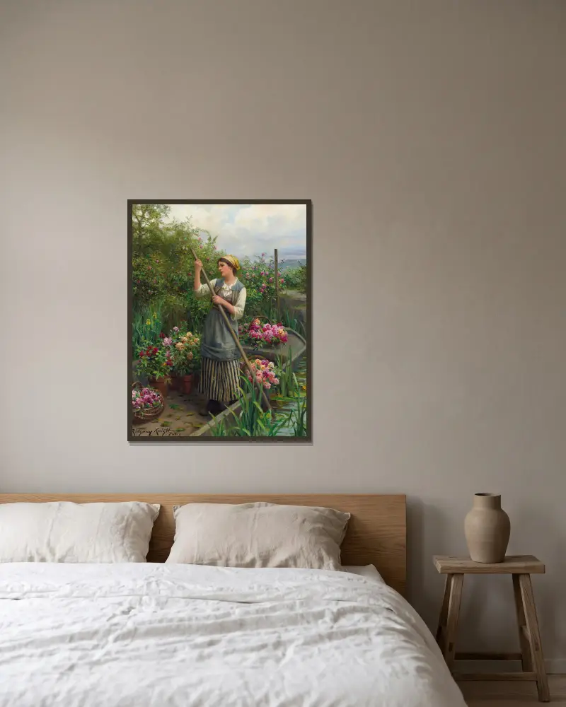 Blomsterplockning längs floden av Daniel Ridgway Knight inramad på en vägg