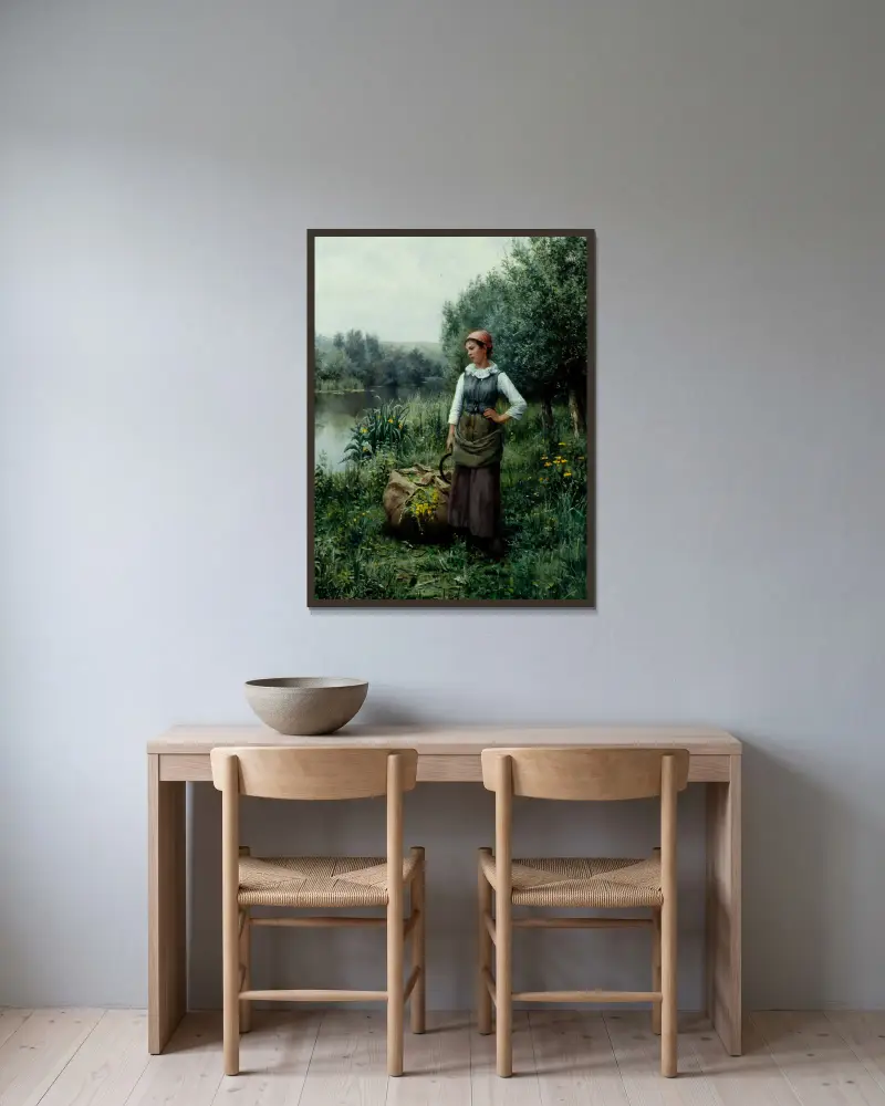 Flicka vid en bäck, Flandern av Daniel Ridgway Knight inramad på en vägg