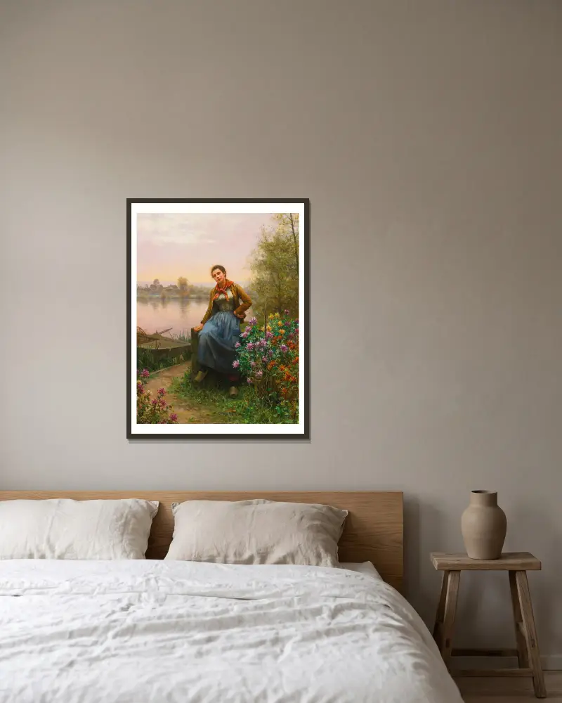 On The River’s Edge av Daniel Ridgway Knight inramad på en vägg