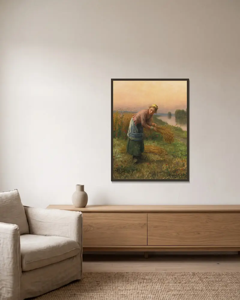 Die Ährenleserin von Daniel Ridgway Knight gerahmt an einer Wand