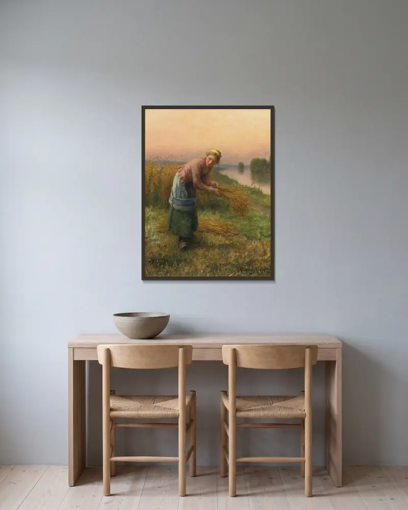 Die Ährenleserin von Daniel Ridgway Knight gerahmt an einer Wand
