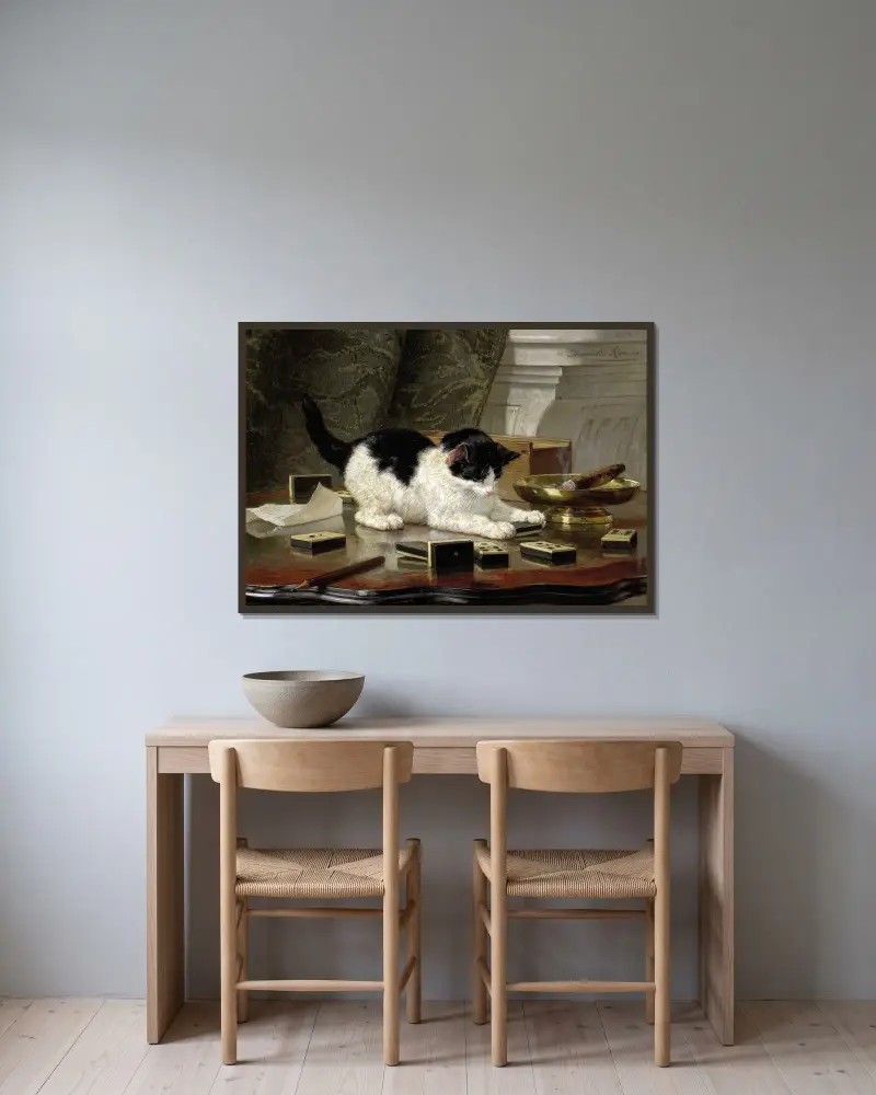 Die Katze beim Spiel von Henriëtte Ronner-Knip gerahmt an einer Wand