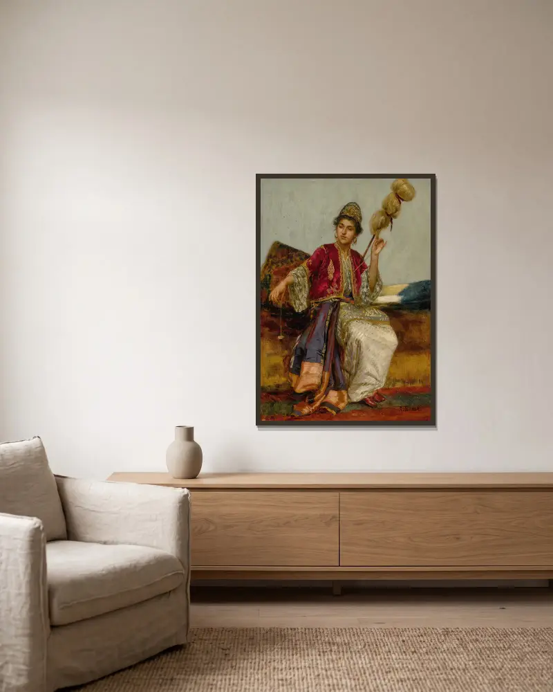 La Fileuse av Rudolf Ernst inramad på en vägg