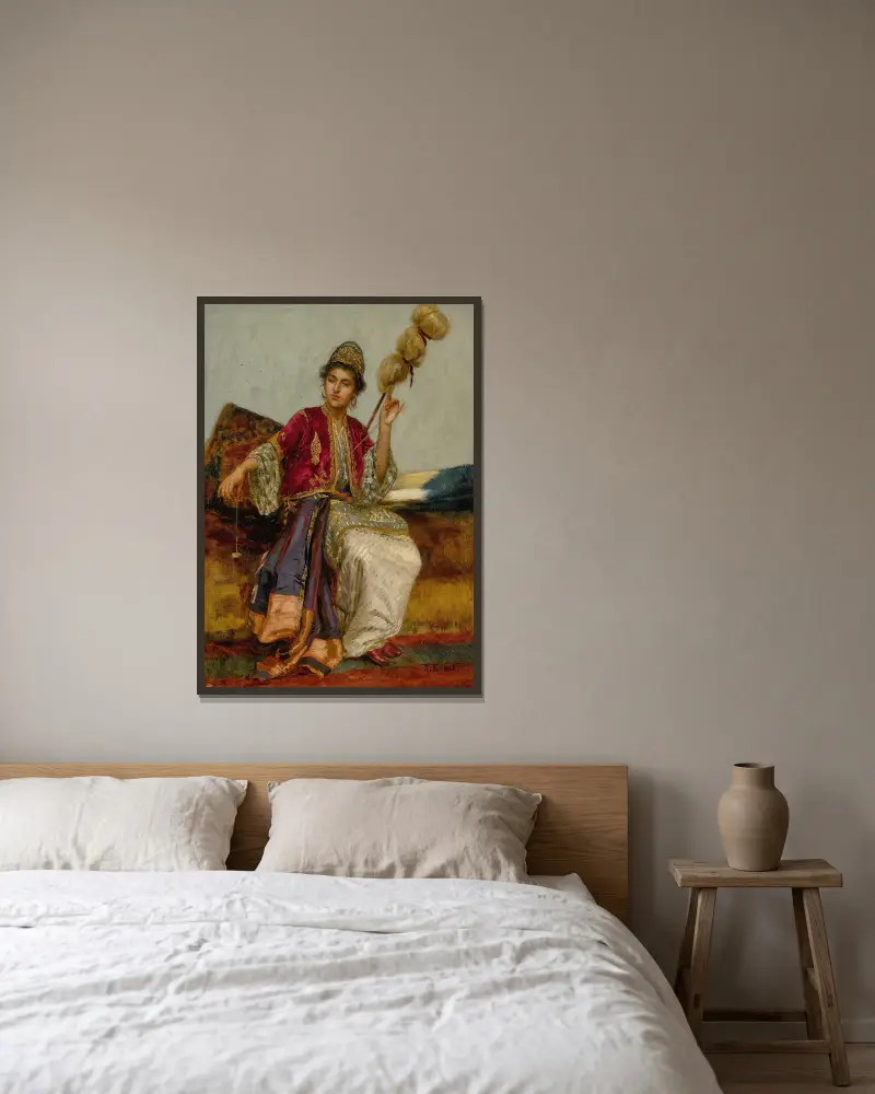 La Fileuse av Rudolf Ernst inramad på en vägg