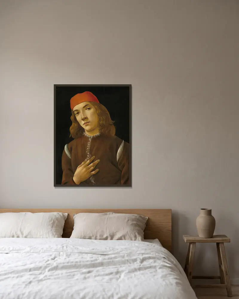 Porträtt av en yngling av Sandro Botticelli inramad på en vägg