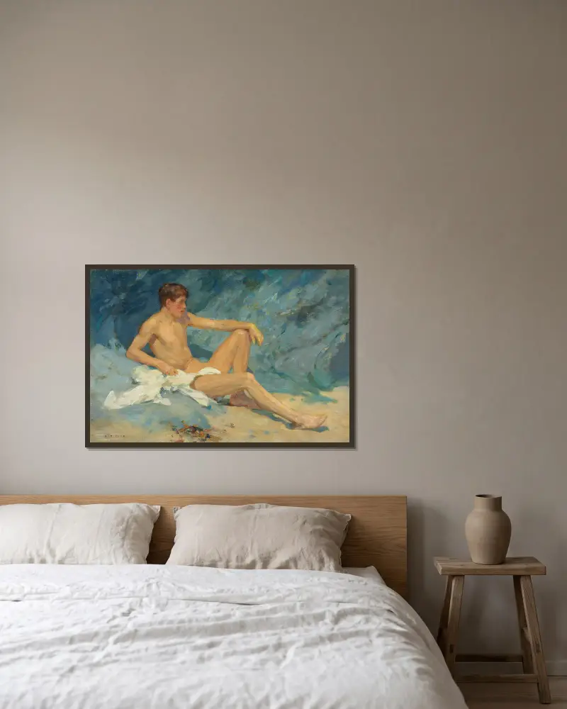 En liggande manlig nakenstudie på klippor av Henry Scott Tuke inramad på en vägg