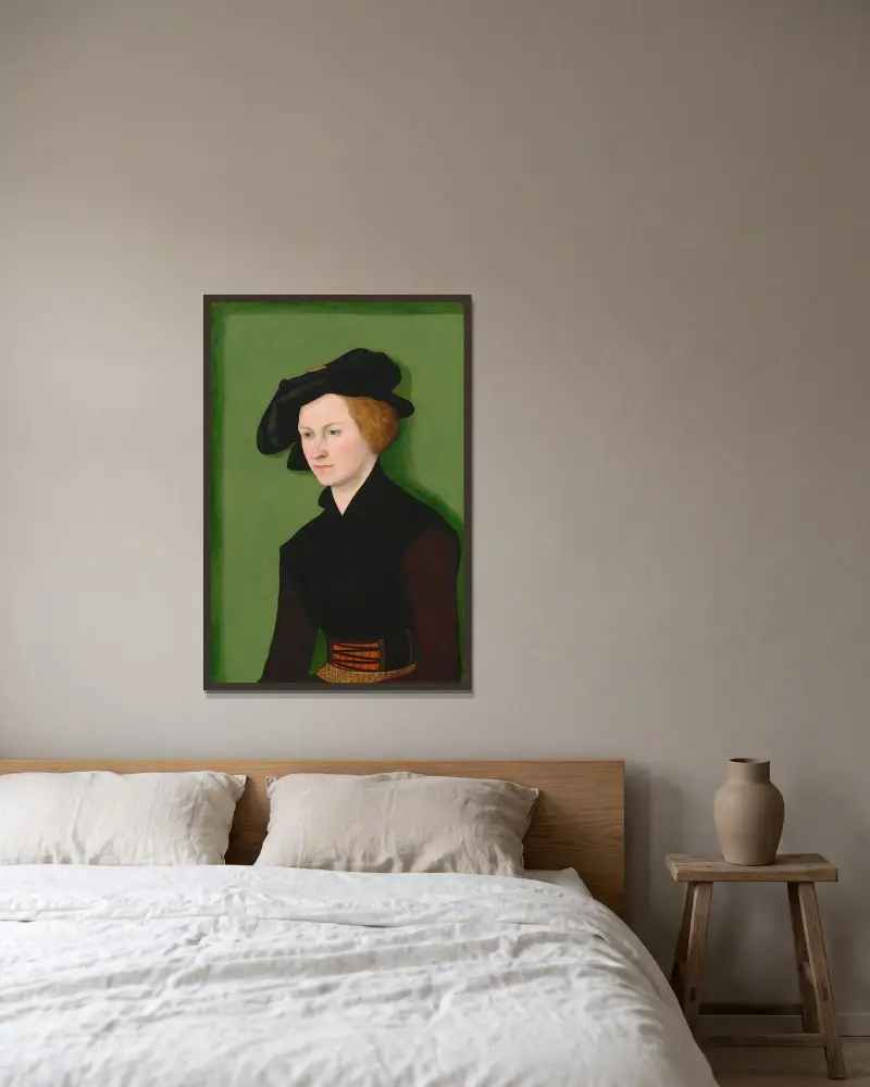 Porträtt av en kvinna av Lucas Cranach the Elder inramad på en vägg