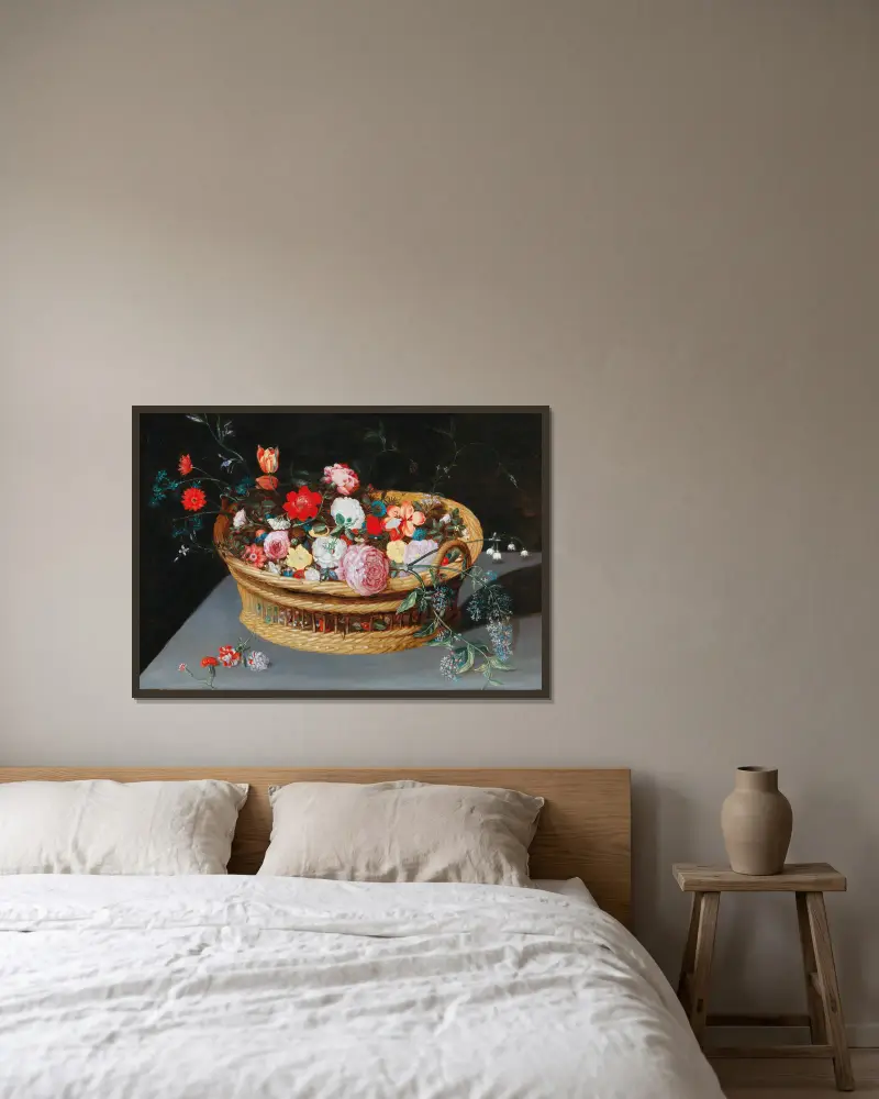 Ein Korb mit Frühlingsblumen auf einem Steintisch von Jan Brueghel the Younger gerahmt an einer Wand