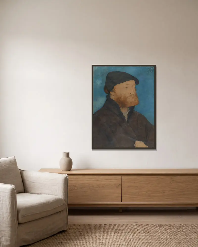 Bildnis eines Mannes mit schwarzem Barett von Hans Holbein The Younger gerahmt an einer Wand