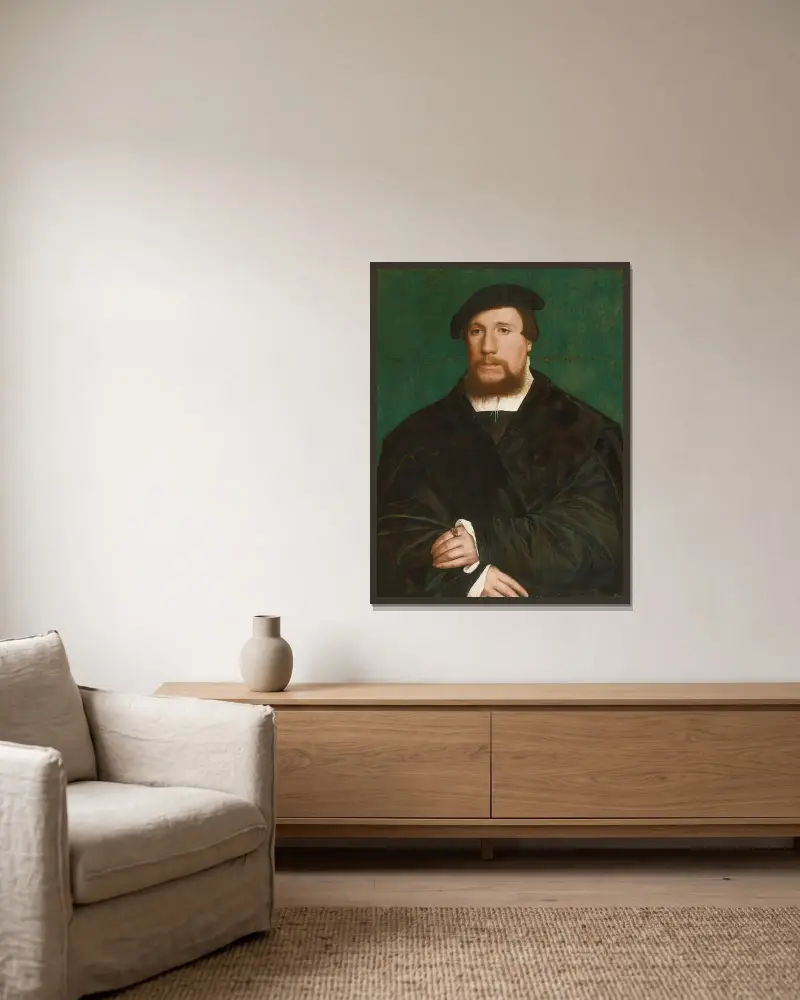 Porträt eines hanseatischen Kaufmanns von Hans Holbein The Younger gerahmt an einer Wand