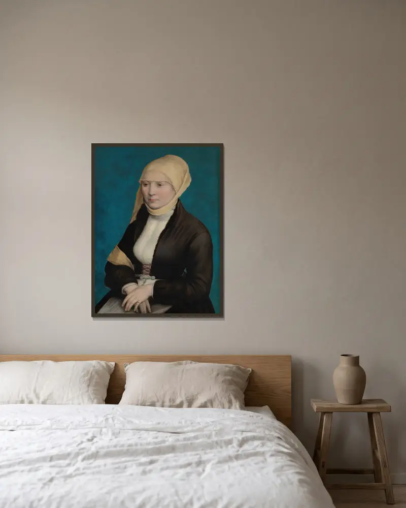Porträtt av en kvinna från södra Tyskland av Hans Holbein The Younger inramad på en vägg