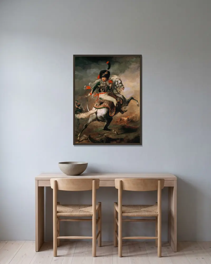 The Charging Chasseur av Théodore Géricault inramad på en vägg
