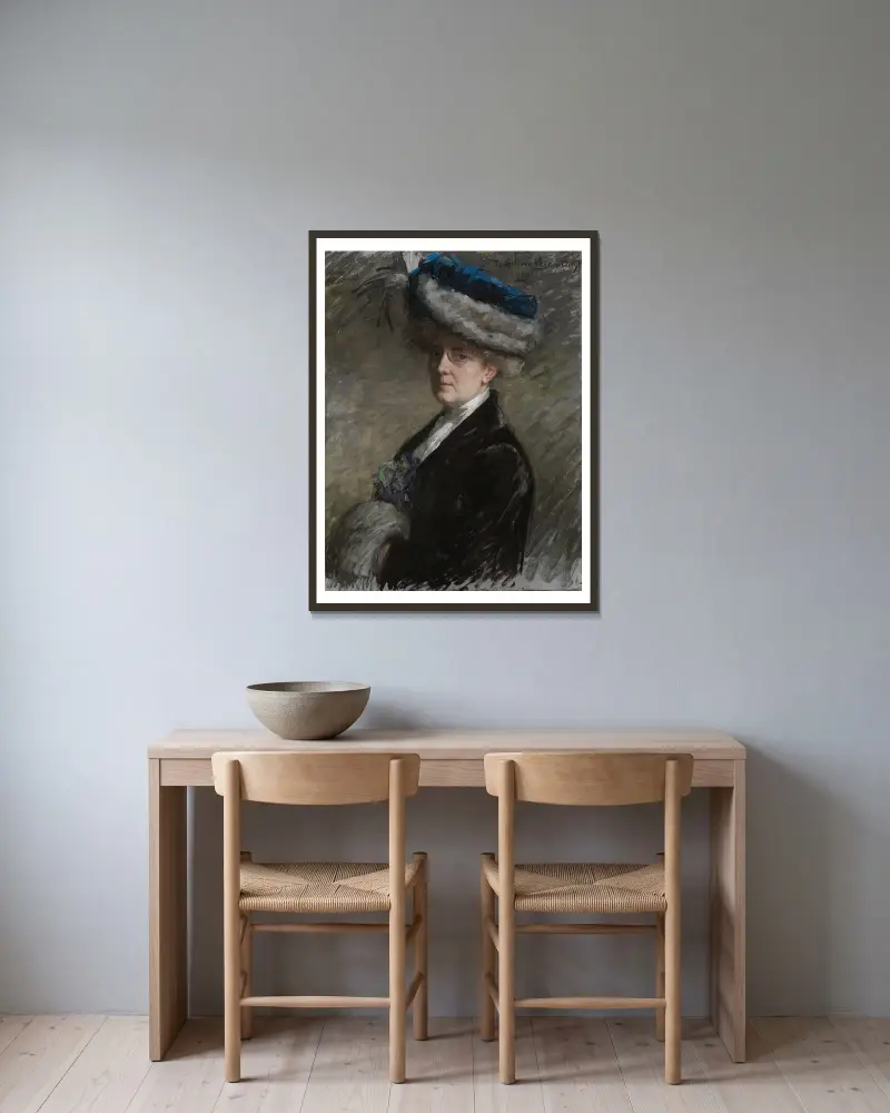 Selbstporträt von Thérèse Schwartze gerahmt an einer Wand