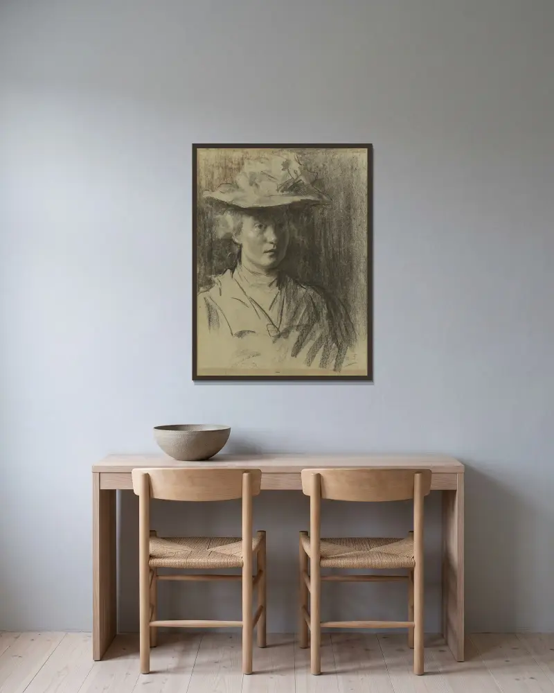 Kvinna med hatt av Thérèse Schwartze inramad på en vägg