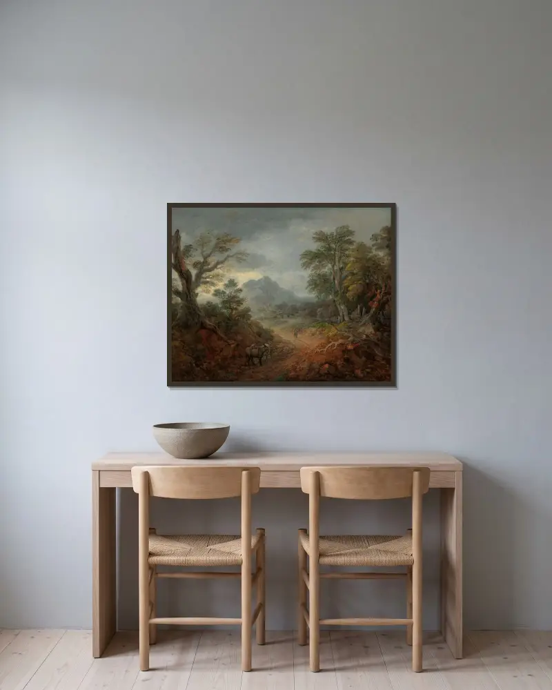 Skogslandskap med åsnor och figurer på en stig av Thomas Gainsborough inramad på en vägg