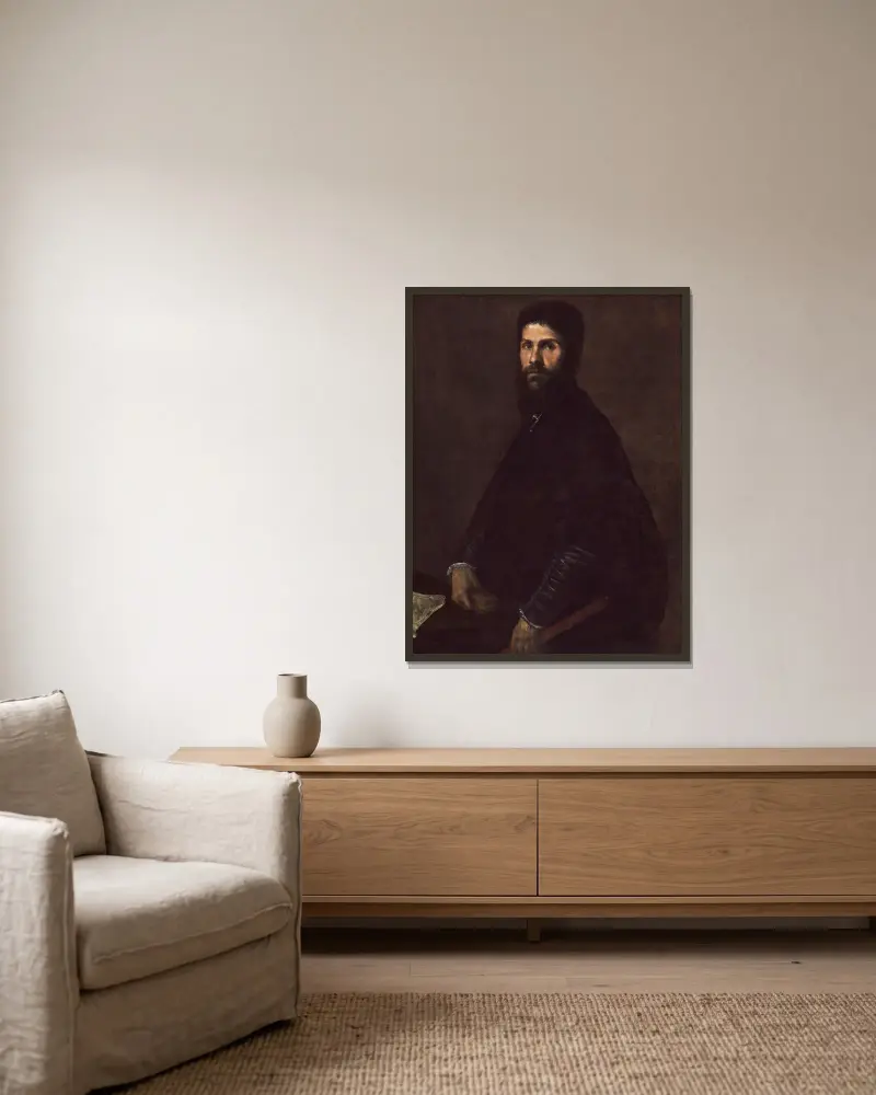Man Holding a Flute av Titian inramad på en vägg