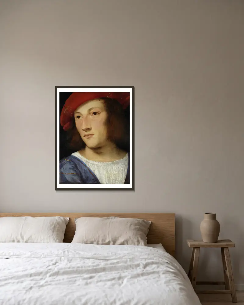 Portrait of a Young Man av Titian inramad på en vägg
