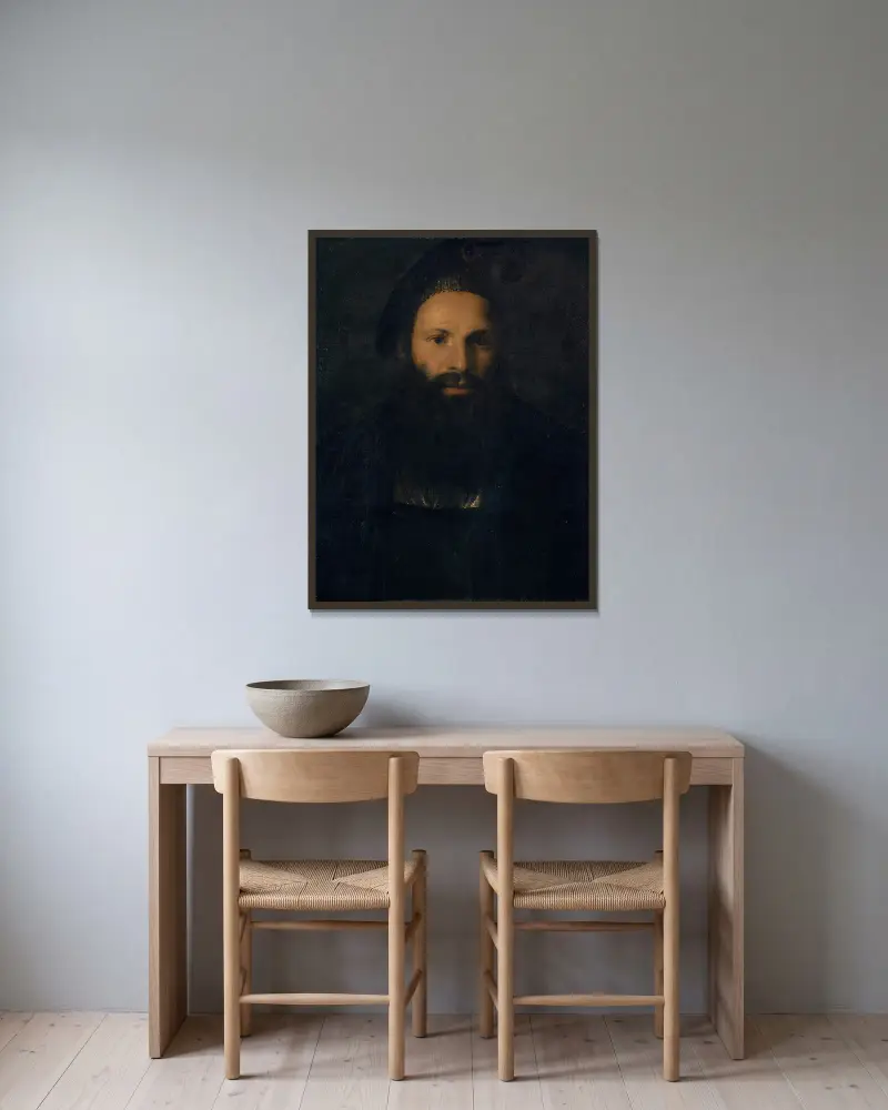 Portrait of Pietro Aretino av Titian inramad på en vägg
