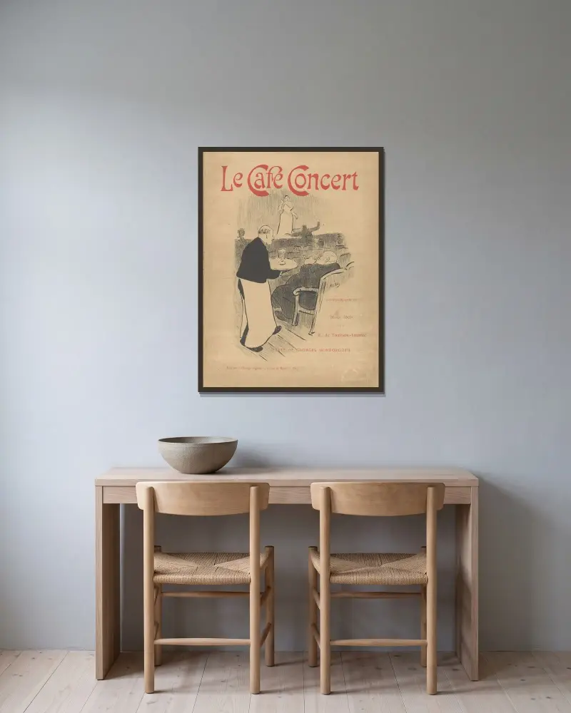 Omslag och titel till portföljen; Le Café Concert av Henri de Toulouse-Lautrec inramad på en vägg
