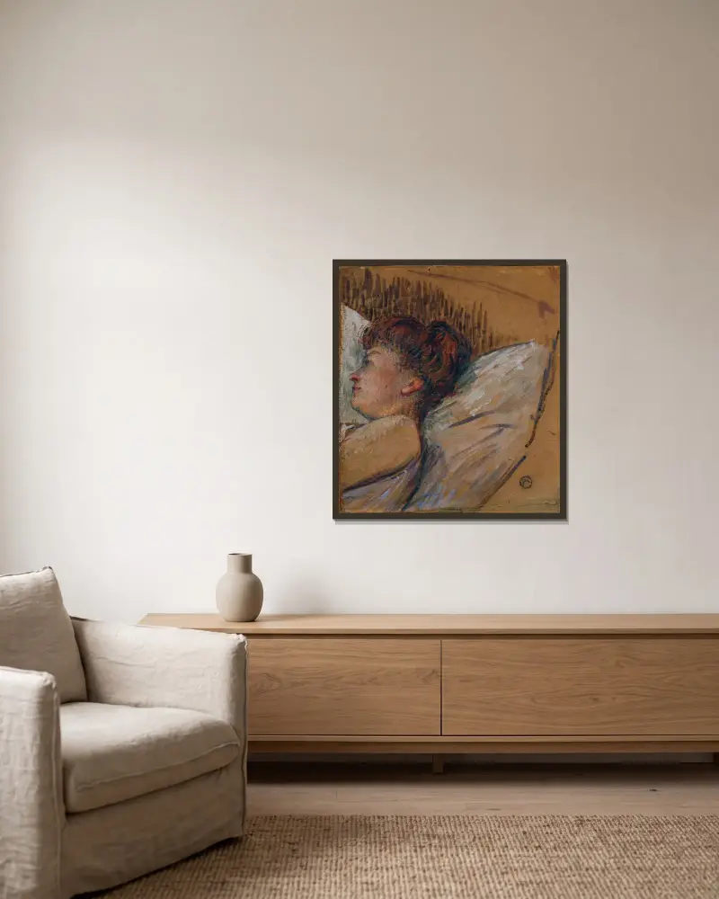 Kvinna i säng av Henri de Toulouse-Lautrec inramad på en vägg