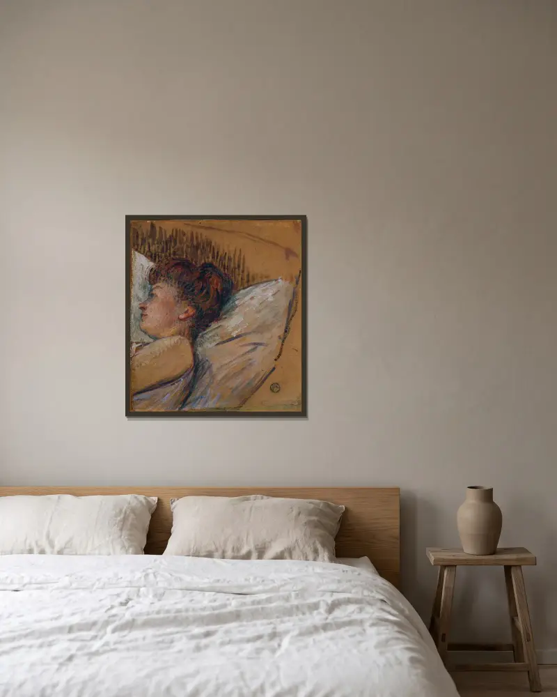 Kvinna i säng av Henri de Toulouse-Lautrec inramad på en vägg