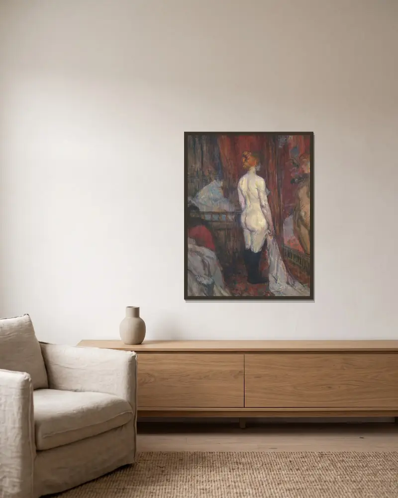 Kvinna framför en spegel av Henri de Toulouse-Lautrec inramad på en vägg