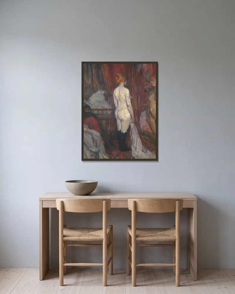 Kvinna framför en spegel av Henri de Toulouse-Lautrec inramad på en vägg