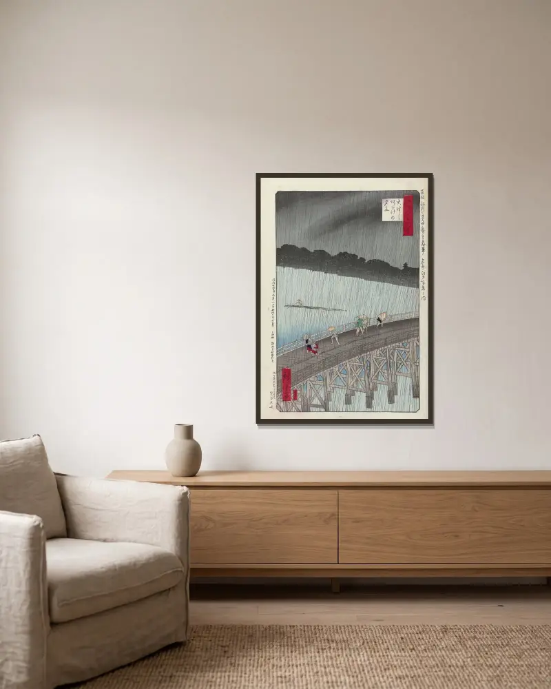 Kvällsregn vid Ohashi-atake av Utagawa Hiroshige inramad på en vägg