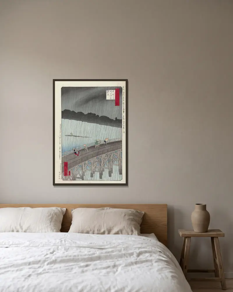 Kvällsregn vid Ohashi-atake av Utagawa Hiroshige inramad på en vägg
