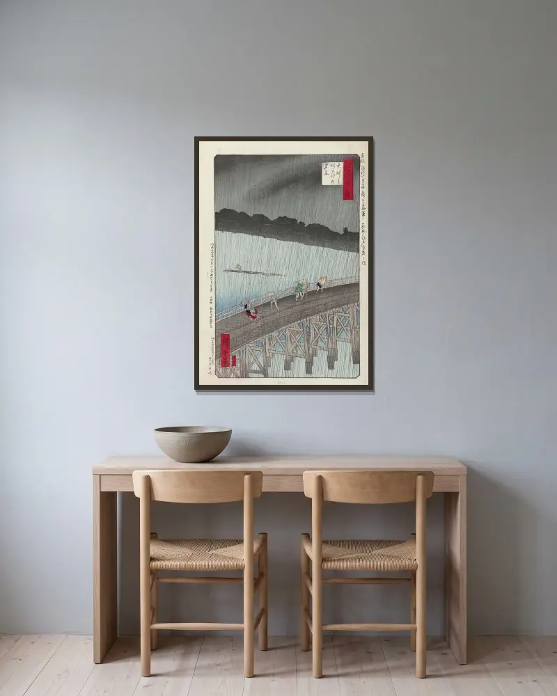Kvällsregn vid Ohashi-atake av Utagawa Hiroshige inramad på en vägg