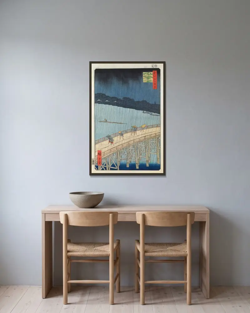 Plötsligt regn över Ohashi-bron och Atake av Utagawa Hiroshige inramad på en vägg