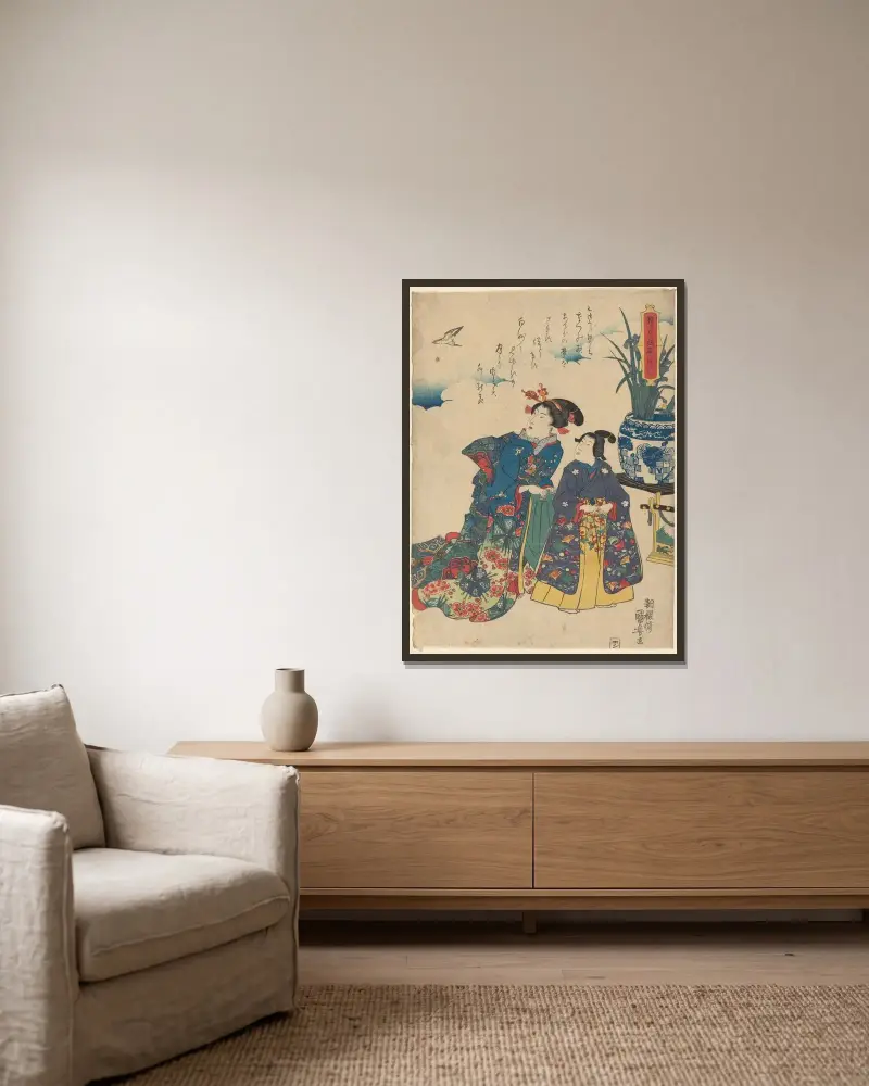 Två kvinnor betraktar en fågel av Utagawa Kuniyoshi inramad på en vägg