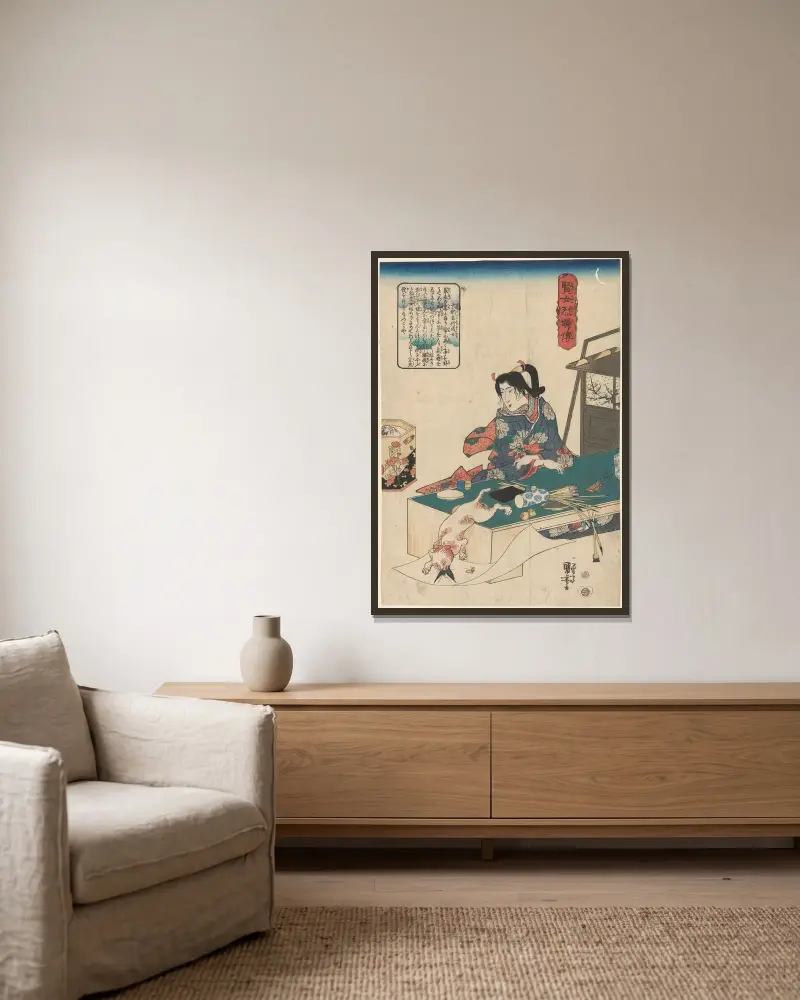 Kvinna vid bord, vit katt som kastar sig över fjäril av Utagawa Kuniyoshi inramad på en vägg