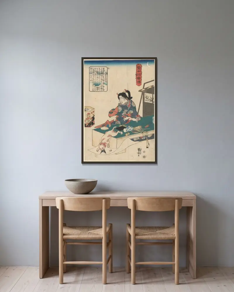 Kvinna vid bord, vit katt som kastar sig över fjäril av Utagawa Kuniyoshi inramad på en vägg
