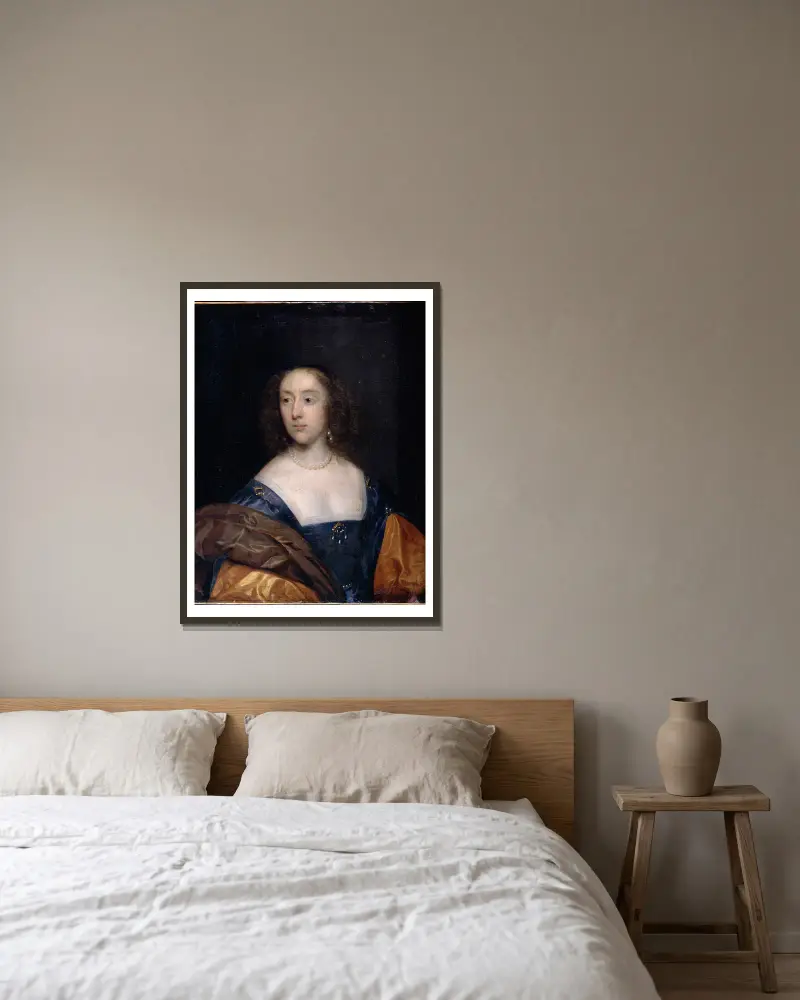 Portrait of a Lady in Blue av Cornelis Jonson van Ceulen inramad på en vägg