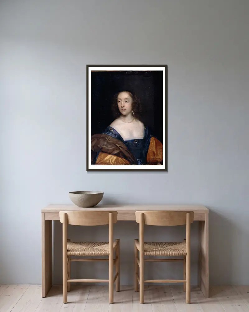 Portrait of a Lady in Blue av Cornelis Jonson van Ceulen inramad på en vägg