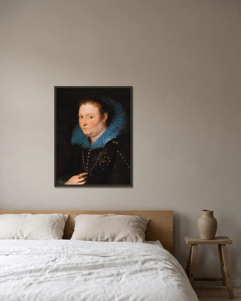 Porträtt av en dam, halvfigur, sagd vara en genuesisk adelsdam av Anthony van Dyck inramad på en vägg