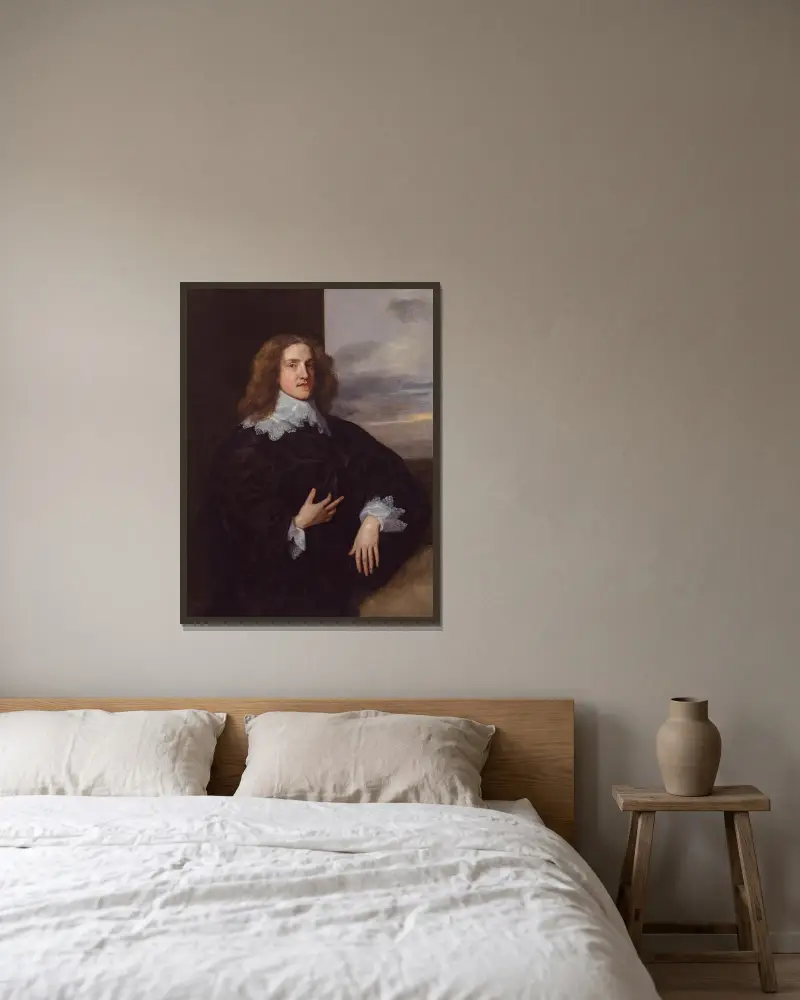 Bildnis eines jungen Edelmanns von Anthony van Dyck gerahmt an einer Wand