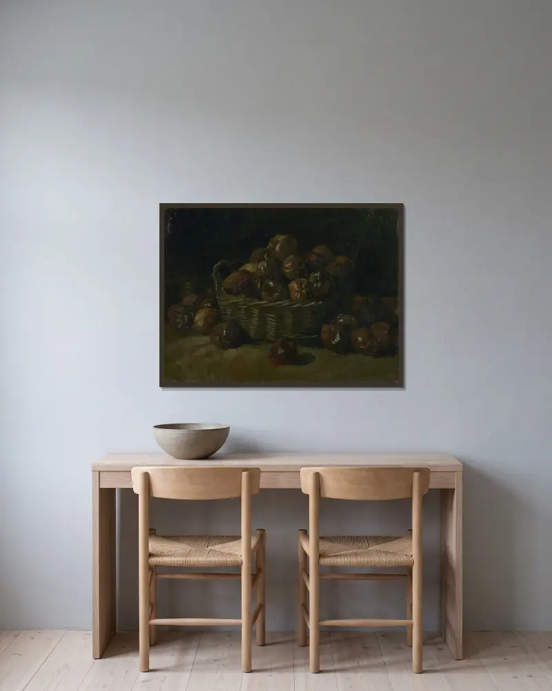 Basket of apples av Vincent van Gogh inramad på en vägg